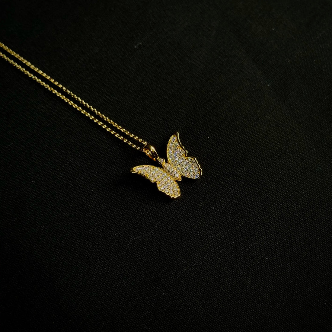 gold colored butterfly pendant for women