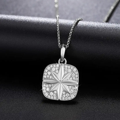 Moissanite compass pendant