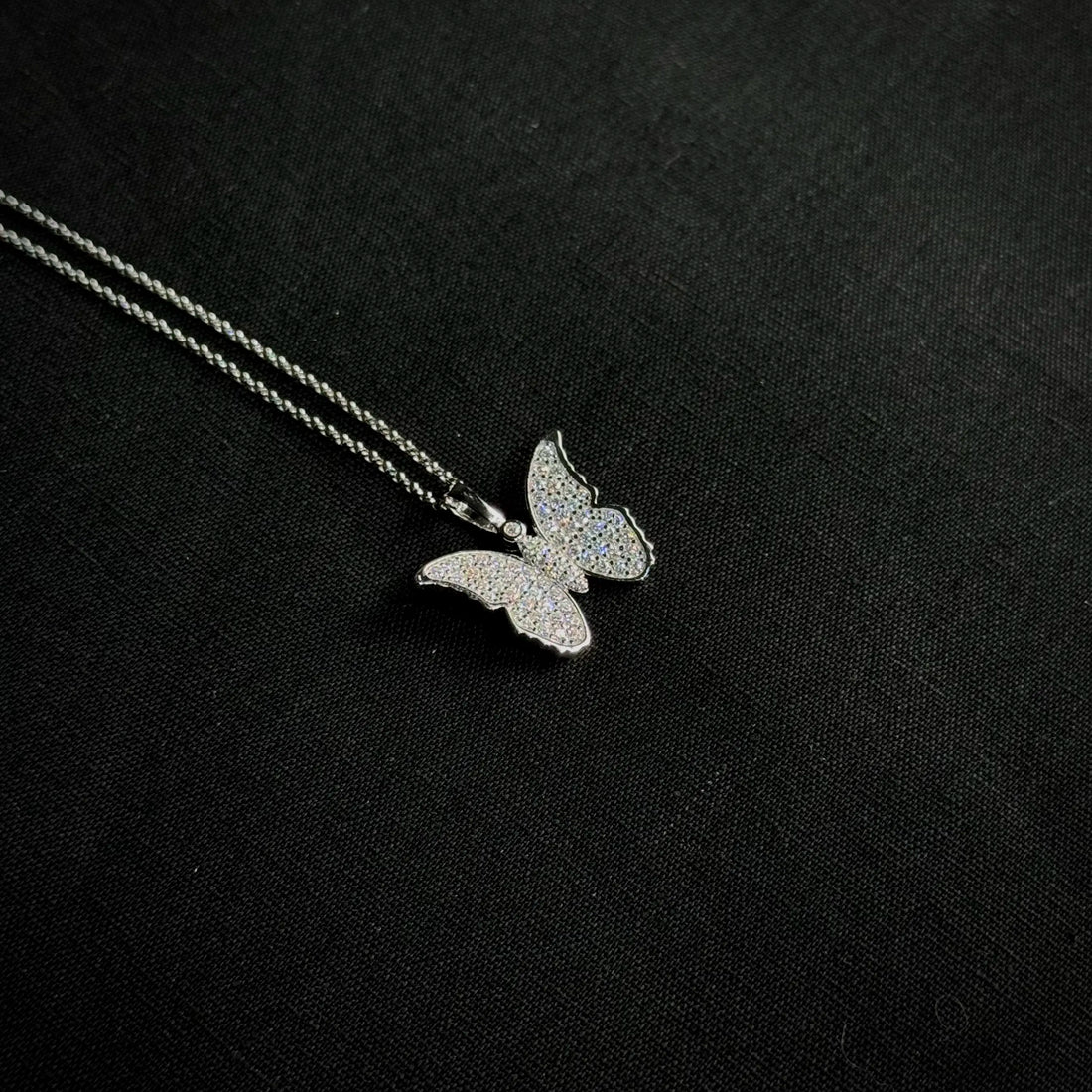 silver colored butterfly pendant for women